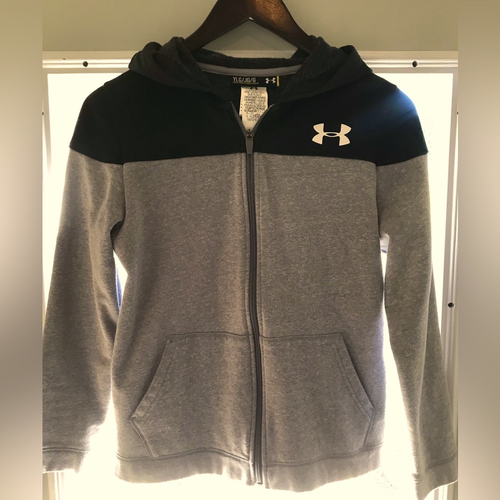 Under Armour zip hoodie.  Stylish waste logo and hood with design.